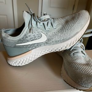 Gently Used, Nike Eoic React, Womens size 6.5 sneakers. Baby- Blue.